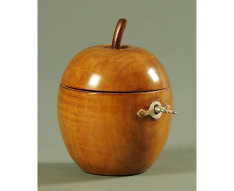 A turned fruitwood apple form tea caddy, in the Georgian style.  Overall height 11 cm. 