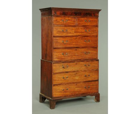 A George III mahogany tallboy, with moulded Greek key cornice above two short and three long graduated drawers to the upper h