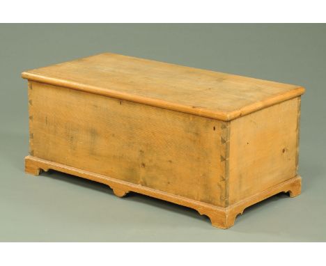 A Victorian pine bedding box, raised on bracket feet, width 104 cm.