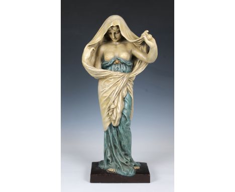Nature Revealing Herself before Science' a tall Goldscheider Pottery figure, model no.1036, modelled standing, on rectangular