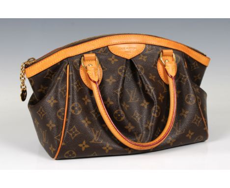 Louis Vuitton Tivoli PM monogram bag, In the classic style with dual handles. Made with monogram canvas with vachetta leather