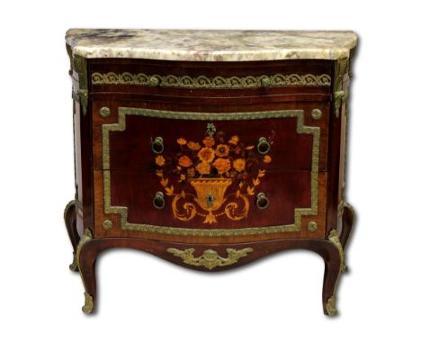 A Louis XV style marquetry inlaid ormolu mounted commode, The grey marble top above three graduated drawers, on cabriole legs