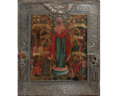 A 19th Century Russian Icon depicting Mary Mother of God and a multitude of saints, The silver oklad indistinctly marked to l