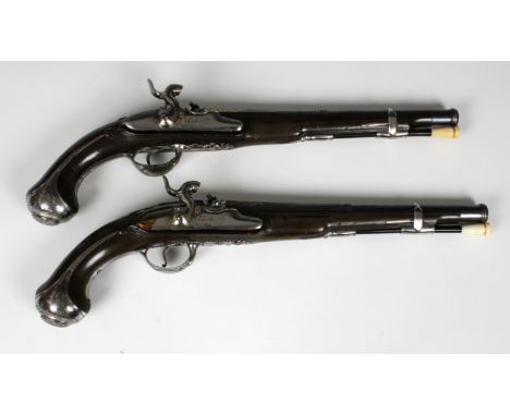A fine pair of 25 bore Spanish holster pistols by Valentin Lopez, Madrid, Circa 1795, converted to percussion by Aquilino Apa