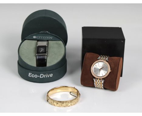 A yellow metal hinged bangle, stamped '1/5 9ct metal core'; a ladies Michael Kors tri-colour metal wristwatch, stainless stee