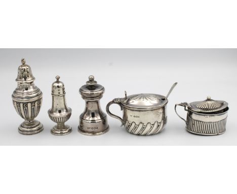 A small collection of silver condiments, to include a Pepper Grinder with import mark for Mappin &amp; Webb, Sheffield, 1939,