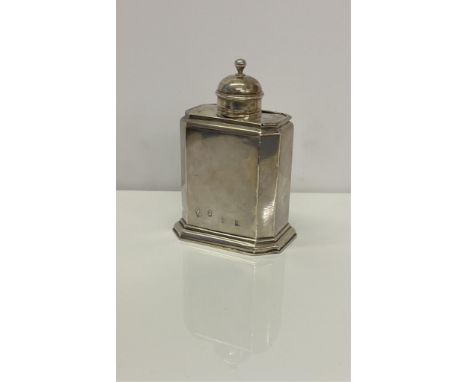 A George I Britannia standard silver tea caddy, John Farnell, London, 1720, of cut cornered rectangular form, having a pull-o