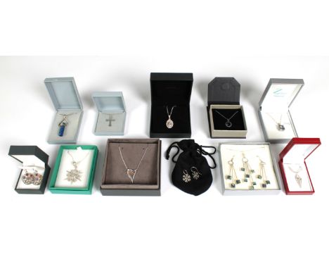 A collection of silver jewellery, to include a St.Christopher with chain, cross with chain, Celtic harp and more. All boxed 1