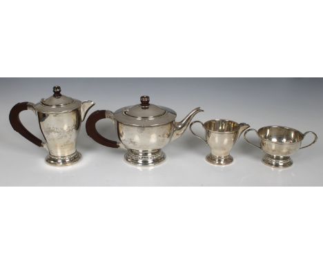 A George VI silver four piece tea service, Charles S Green &amp; Co Ltd, Birmingham, 1939/40, of cylindrical pedestal form, c