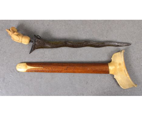 South East Asian Kris or "Keris", with carved Garuda bird hilt, wavy edge 31cm. blade, original scabbard.