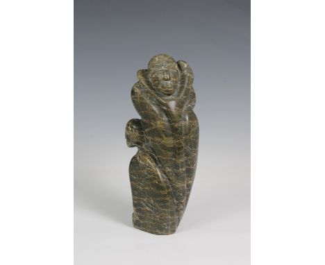 An Inuit striated stone carving by Jutai Felix Toonoo (1959-2015), Cape Dorset, Father and Child, with engraved inscription, 