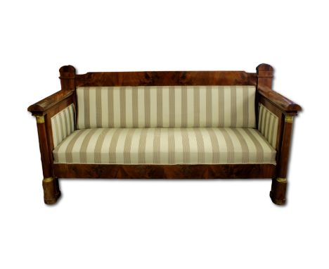 A French Empire gilt mounted mahogany settee, With striped pale green upholstery, 207.5cm x 84.5cm x 107cm high