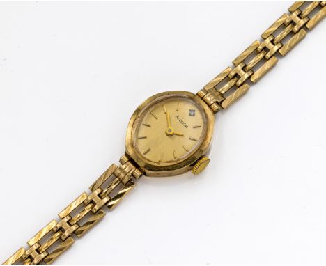 A ladies 9ct yellow gold Accurist wristwatch, Oval dial, baton indicators, integral bracelet strap, total gross weight approx