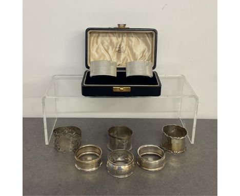 A pair of silver Art Deco napkin rings, Adie Brothers Ltd, Birmingham, 1934,  in presentation case marked Rattray &amp; Co Du