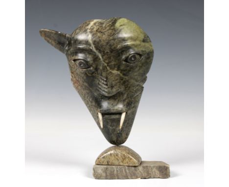 An Inuit green stone and antler carving by David Ruben Piqtoukin (b.1950), "Spirit Lover", Eskimo landscape inscribed on reve