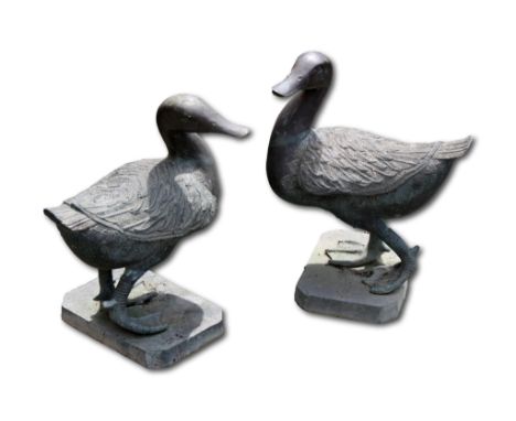 Garden statuary - A pair of metal garden duck ornaments / figures, 30cm. high. (2)
