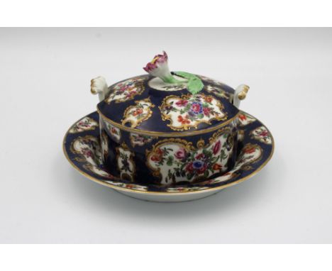 A first period Worcester blue scale ground butter dish, cover and stand, c.1765, all with blue square seal marks, painted wit