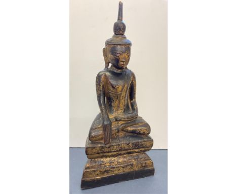 A Thai lacquered &amp; gilded figure of Buddha Shakyamuni, probably 19th century, 50cm. high.