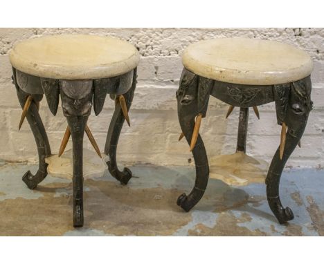 STOOLS, 42cm H x 32cm D, a pair, early 20th century ebonised and white painted with elephant trunk legs. (2) 