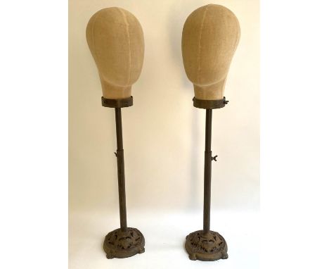 MANNEQUIN HEADS, a pair, on stands, 61cm x 14cm, French style. (2) 