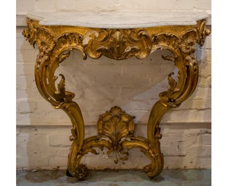 CONSOLE TABLE, 107cm H x 48cm D x 106cm L, mid Victorian giltwood with serpentine marble top on scroll supports. 