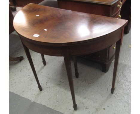 Edwardian mahogany demi lune fold-over card table on square legs with spade feet.(B.P. 24% incl. VAT)