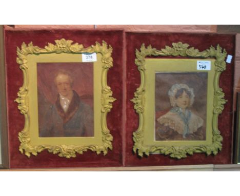 British School, (19th Century), portrait of a well to do couple, a pair, watercolours within Ormolu mounted velvet frames. (2