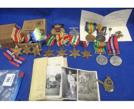 Three medal groups together with soldier's service book and relevant photographs relating to Victor Brynmor Thomas of the Roy