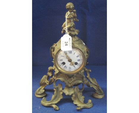 19th Century French Ormolu Cartel clock with putti mount, enamel face and two train drum movement striking on one bell.(B.P. 