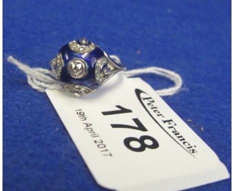 18ct white gold, blue enamelled, domed dress ring, set with diamond chips.(B.P. 24% incl. VAT)   CONDITION REPORT:  Good qual