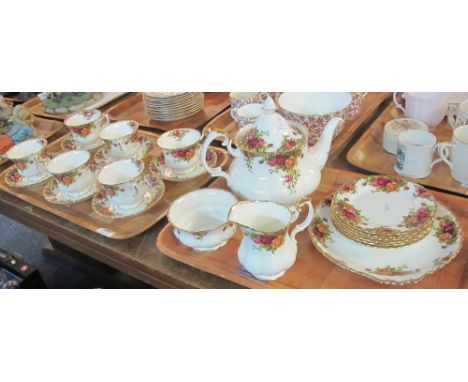 Two trays of Royal Albert bone china 'Old Country Roses' teaware comprising: teacups and saucers; teapot; milk jug; sucrier; 