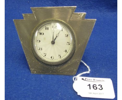Art Deco design, engine turned, silver travelling clock with back winding movement and folding support, Birmingham hallmark.(