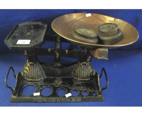 Set of 19th Century cast metal shop scales with copper pan and platform base, having Victorian registration mark and recesses
