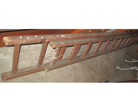 Wooden double extension ladder.(B.P. 24% incl. VAT)