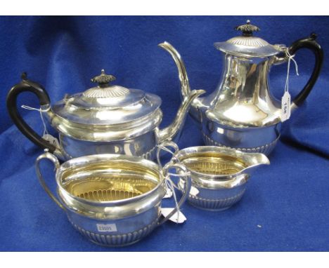 Georgian style half lobed, silver, four piece tea and coffee set, comprising: teapot; coffee pot; two handled sucrier and cre