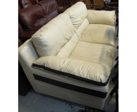 Modern cream leather large two seater sofa.(B.P. 24% incl. VAT)