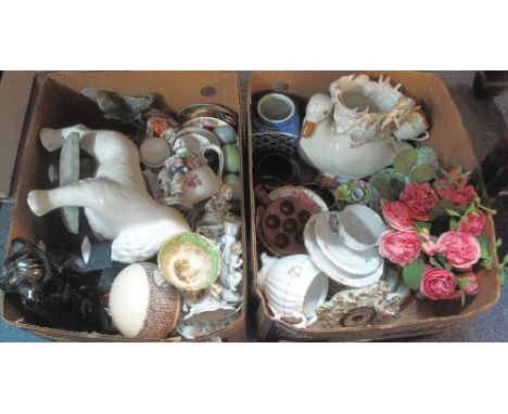 Two boxes of assorted china to include: various Continental figures; German relief figural and foliate clock; various teaware