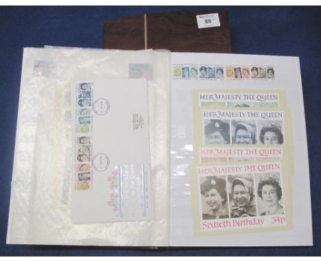 Range of Great Britain First Day Covers, Post Office cards and a few mint sets in two brown clear view stockbooks.(B.P. 24% i