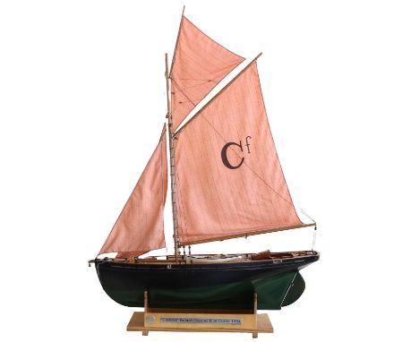 Bristol Channel Pilot Cutter Cariad 1904 fine scale model, constructed primarily of wood with rowing boat on deck and single 