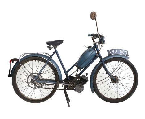 Raleigh 2 Wheel Bicycle with a bolt on engine  Motorized bicycle for restorationNo paperwork relating this bike or the regist