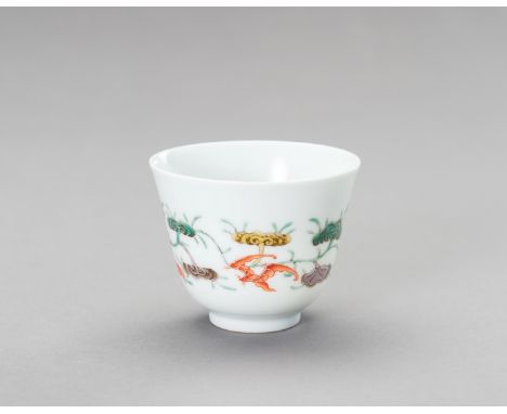 A 'LINGZHI AND BATS' PORCELAIN CUP, QING DYNASTYChina, 1644-1912. Painted in polychrome enamels of green, aubergine, yellow a