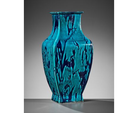 A TURQUOISE AND AUBERGINE-GLAZED SQUARE BALUSTER VASE, 18TH CENTURYChina. The sides rising from a tall spreading foot to a ro