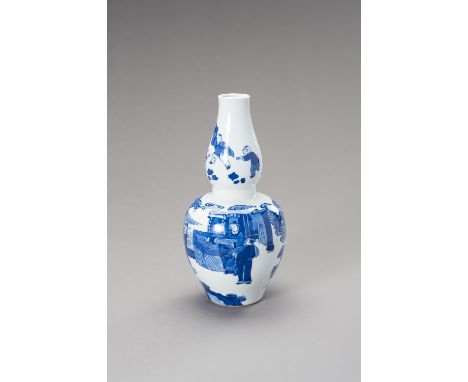 A BLUE AND WHITE DOUBLE GOURD VASE, LATE QING TO REPUBLICChina, late Qing dynasty (1644-1912) to Republic period (1912-1949).