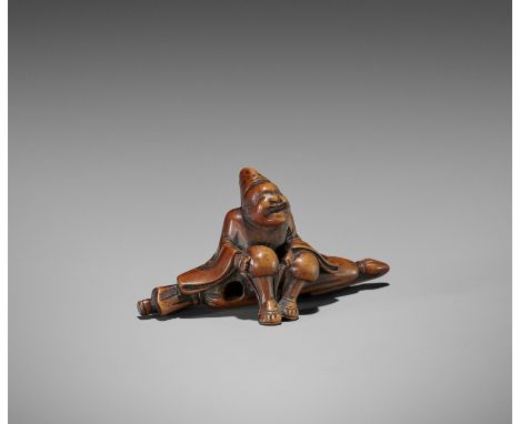 A WOOD NETSUKE OF A TEMPLE SERVANT (EJI)UnsignedJapan, probably Edo, early 19th century, Edo period (1615-1868)The temple ser