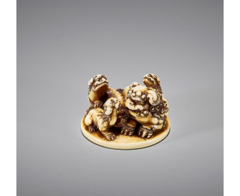 A FINE IVORY NETSUKE OF A GROUP OF SHISHIUnsignedJapan, Tokyo, second half of 19th centuryFinely carved as a lively group of 