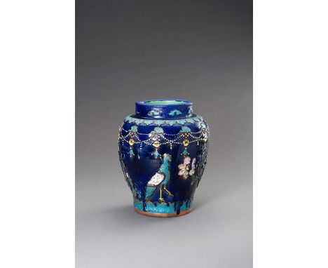 A FAHUA GLAZED BALUSTER VASE, MING DYNASTYChina, 17th century. The ceramic vase with a baluster body decorated with jeweled p