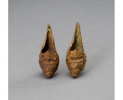 A PAIR OF KHMER GOLD CONCH SHELL EARRINGSCambodia, c. 10th century. The earrings in form of a conch shell with an aperture fo