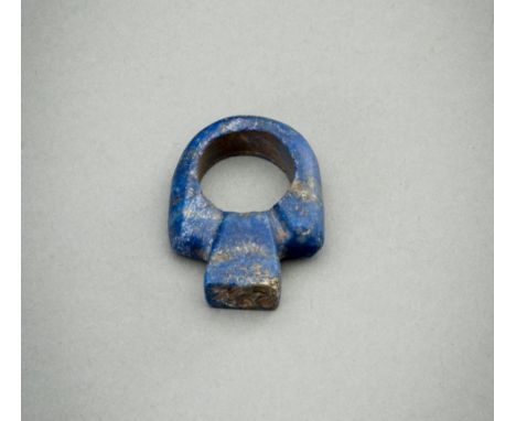 A CARVED LAPIS LAZULI RINGPersia, presumably c. 1500-2000 years old. Carved from lapis lazuli, the rectangular bezel with an 