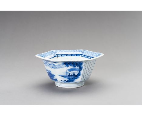 A BLUE AND WHITE 'POEM' BOWL, LATE QING DYNASTYChina, Qing dynasty (1644-1912), 19th century. Of hexagonal shape, with steep 