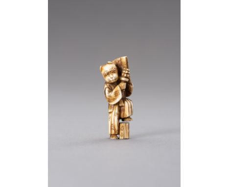 AN IVORY NETSUKE OF A KYOGEN ACTOR WITH FOX MASKJapan, 19th century, Meiji period (1868-1912)The finely carved and stained ne